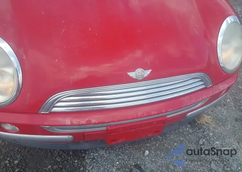 2004 Mini Cooper z USA, uszkodzony, nr VIN WMWRC33404TJ58399